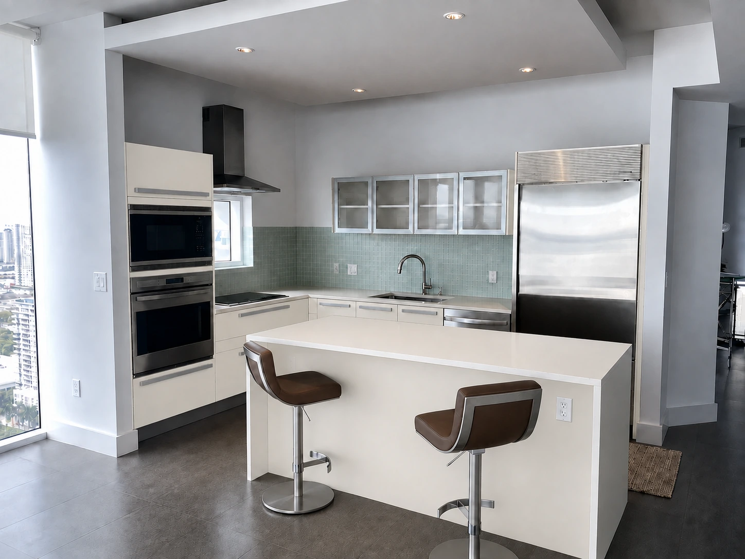 After: soft white on the same kitchen cabinets